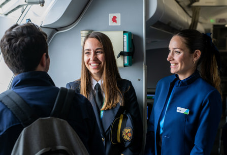 LEVEL cabin crew welcoming passenger on board