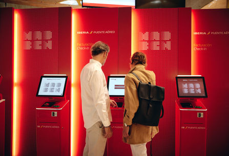 Iberia check-in kiosk being used