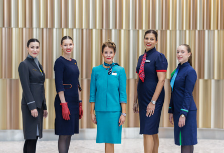 Members of cabin crew of all IAG airlines posing at Terminal 5