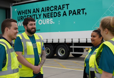 IAG Cargo staff standing near truck 3