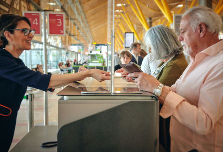 Customers at Iberia check-in desk