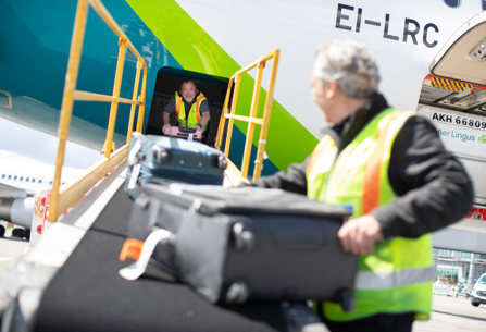 Aer Lingus ground staff handling baggage
