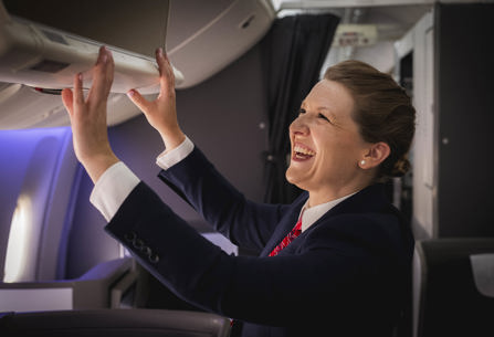British Aiways cabin crew member on board plane